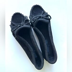 Minnetonka slip on shoe.